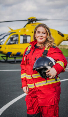 NWAA Dr-Eimhear-Quinn with helicopter in background