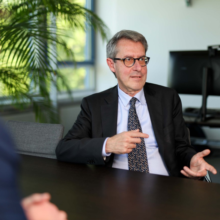 Eurofighter CEO sitting at table