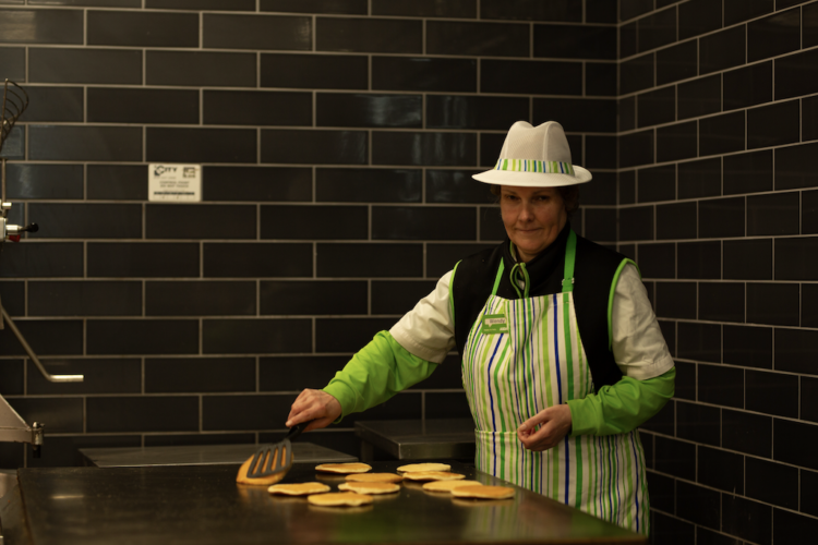 asda worker making pancakes